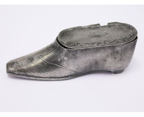 A 19th Century pewter snuff box of boot form. L9cm