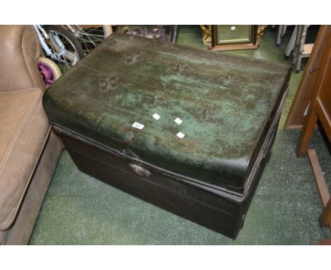 A 20th century tin travelling trunk