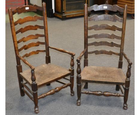 A pair of 19th century ladder back nursing chairs with rush seats, c.1860 (2)