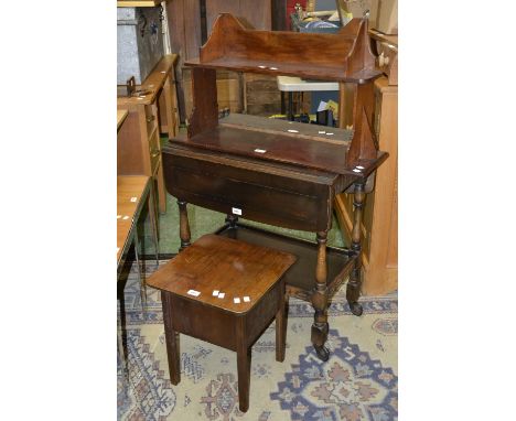 An drop leaf tea trolley; two tier wall shelf; single shelf wall rack; an oak sewing table