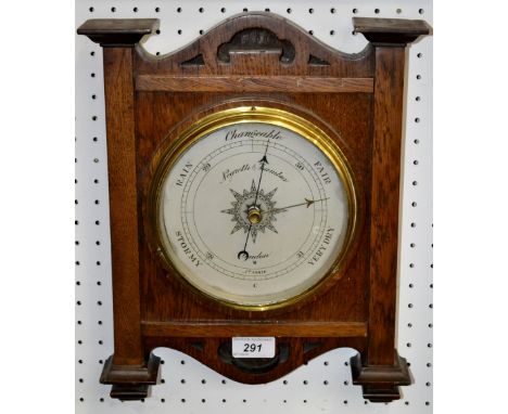 An early 20th century oak framed barometer, by Negretti and Zambra, London 