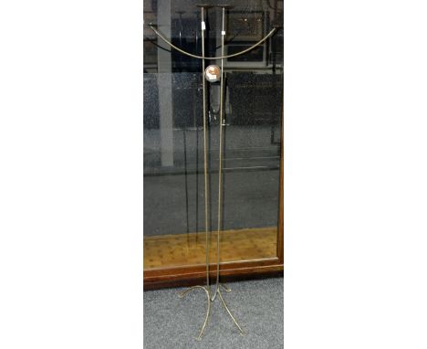 An Arts and Crafts style four light pricket candle stand fashioned in steel bar and copper, 173cm high.
