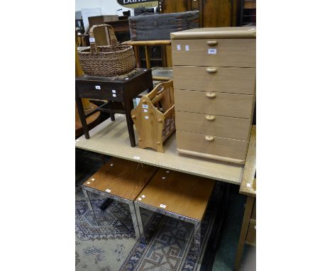 A pair of contemporary teak lamp tables; modern office desk; a five drawer chest; pine magazine rack; wicker basket; an oak s