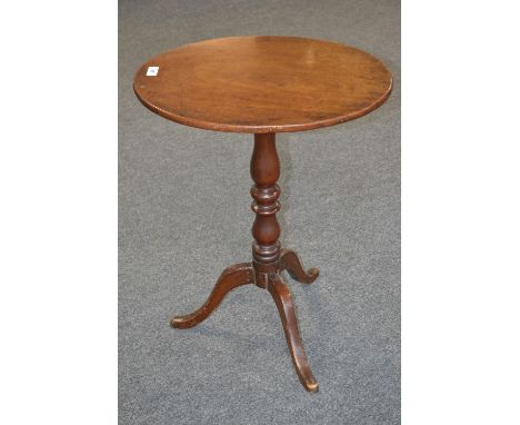 A late Victorian mahogany tilt-top tripod occasional table. oval top, turned column, cabriole legs.