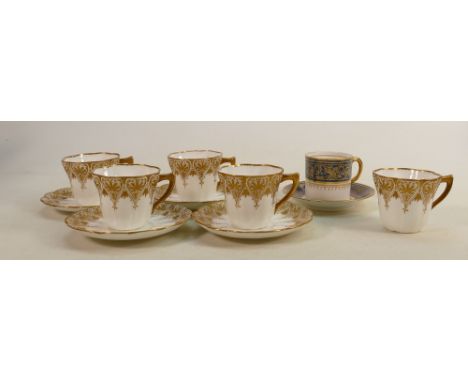 19th century Doulton Burslem gilded cups &amp; saucers: 5 cups and 4 saucers together with an unmarked example. (Firing crack