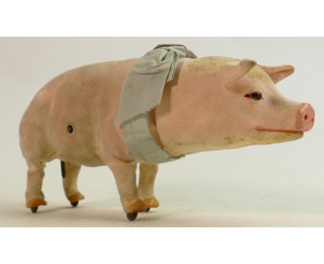 A Roullet et Decamps clockwork automaton pig: Length 26cm in original box and brass key. 