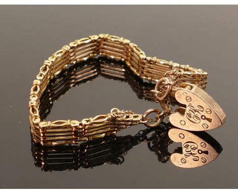 9ct rose gold gate bracelet: Weight 19.6g 