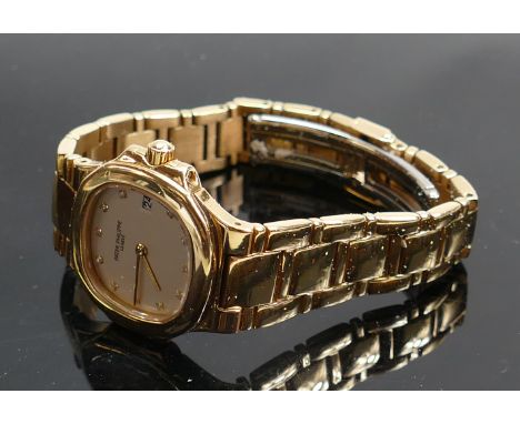 Patek Philippe 18ct gold ladies wristwatch: With 18ct bracelet, diamond hour markers to dial, 95g, boxed with paperwork, rece