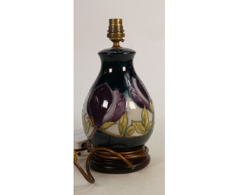 Moorcroft Magnolia on faded green ground lamp base: Height to top of fitting 27cm. 