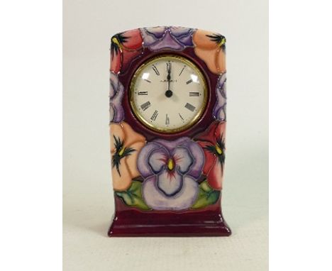 Moorcroft clock Pansy pattern: Measures 15cm x 10cm, with box. No damage or restoration. 