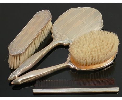 Silver ladies decorated vanity set: Comprising Mirror, 2 brushes and comb. (4) 