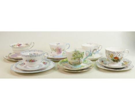 A collection of Shelley floral decorated trios to include: Woodland, D2377, 13303, A8899/6 together with similar cup &amp; sa