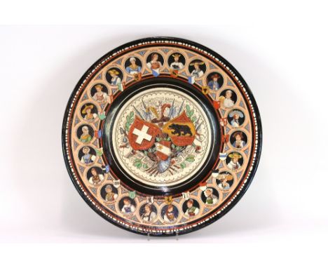 J Wanzenried Thoune Swiss pottery charger, the border decorated with portrait Randles, 60cm diameter