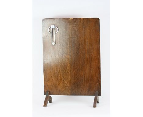 An Art Deco oak veneered fire screen