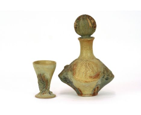 A Bernard Rooke pottery decanter and stopper, initialled B R, 27cm and a set of four similar goblets, 11cm
