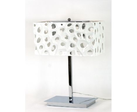 A modern design chrome table lamp with pierced white shade, 52.5cm