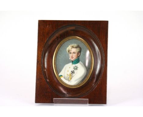 An early 20th Century hand painted miniature portrait on ivory with info verso, 10cm x 8cm