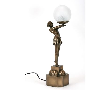 An Art Deco style figural table lamp with circular glass shade, 57cm high in extremes