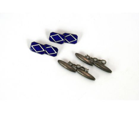 A pair of solid silver cufflinks and a pair of blue and white enamel on silver cufflinks