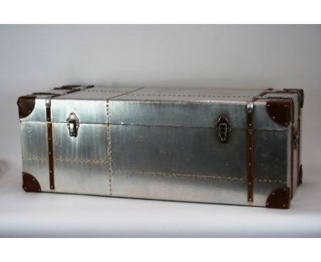 An aluminium leather and stud decorated trunk