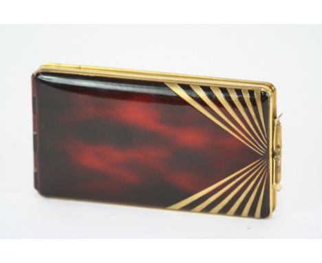 An Art Deco tortoiseshell effect combination compact