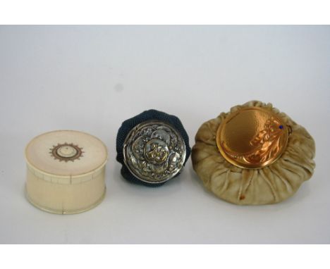 An ivory powder bowl and cover, 4cm; a combined compact pouch bag and another pouch bag