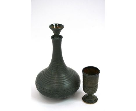 A Saltings pottery Penrhynde decanter and stopper and set of six goblets