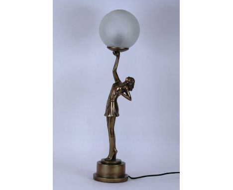 An Art Deco style figural table lamp with circular glass shade, 64cm in extremes