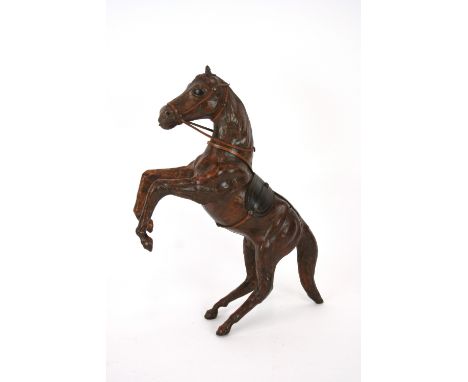 A leather model of a horse, 37cm