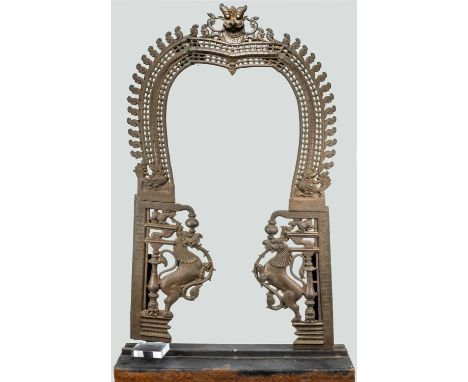 BronzeIndia , 18th century Dimensions: Height 160 cm Wide 90 cm Depth 9 cmWeight: 86 Kilograms with base Large mandorla gate 