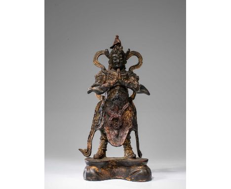 BronzeChina , Ming Dynasty Dimensions: Height 27 cm Wide 13 cm Depth 8 cmWeight: 1285 grams Wei Tuo Bodhisattva, also known a