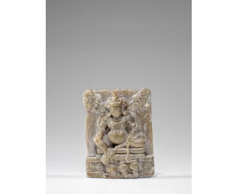 StoneTibet , 18th century Dimensions: Height 8 cm Wide 6 cm Depth 1,5 cmWeight: 126 grams Stone fragment with a carving of Ye