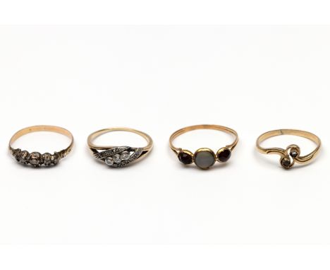Vier gouden ringen. Een 14 kt. gouden ring, 19e eeuw, bezet met roosgeslepen diamant, een 18 kt. gouden ring, 19e eeuw, bezet