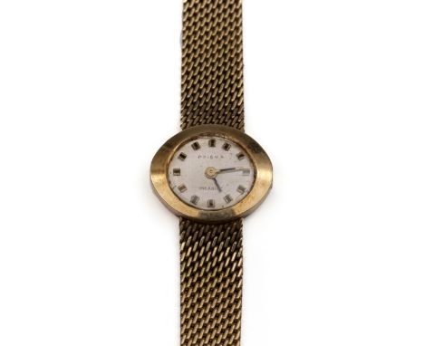 Prisma 14 kt. gouden damespolshorloge. Handopwind. Met zilverkleurige wijzerplaat met batons op de uren, ovale kast en aan ee