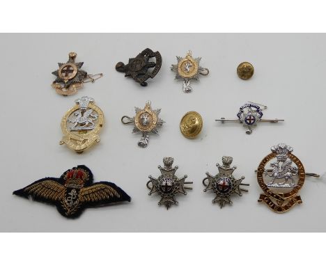 A lot comprising assorted military badges and an RAF patch Condition Report: Available upon request