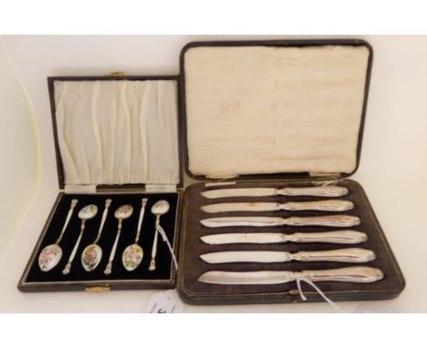 A cased set of six silver and floral enamel coffee spoons, Birmingham 1938, with a cased set of six silver handled cheese kni