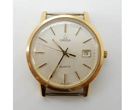 A gold plated gents Omega quartz watch head, diameter 3.4cm, weight 33.2gms Condition Report: Ticking away, has new battery, 