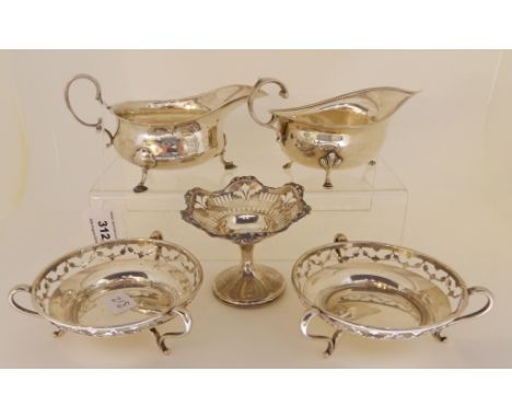 A pair of silver bon bon dishes by William Neale &amp; Son Limited, Birmingham 1911,of circular form with pierced decoration,