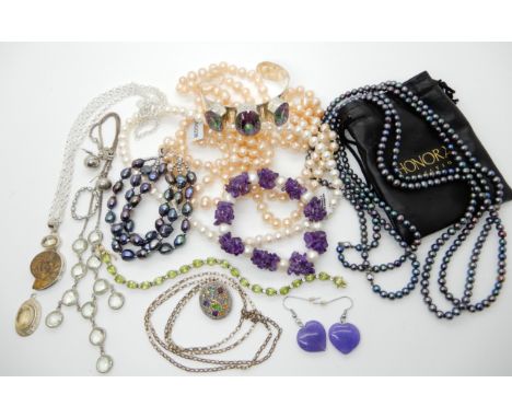 Cultured pearls and silver jewellery to include, two strings of Honora black pearls with 14k white gold clasps, a silver myst