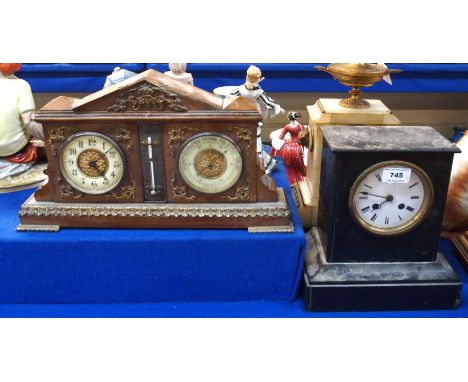 A black slate mantle clock and a wooden mounted clock/barometer Condition Report: Available upon request