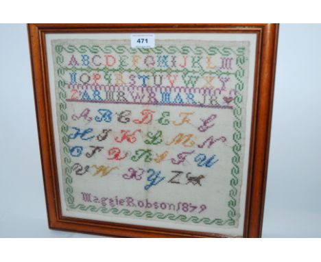 A Victorian framed sampler, Maggie Robson, 1879, 30 x 30cm framed and glazed Condition Report: Available upon request