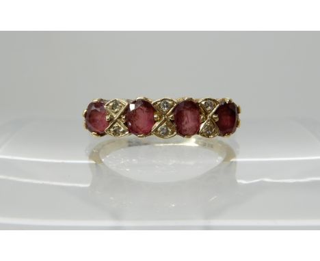 A 9ct ruby and diamond ring, size K, weight 2.7gms Condition Report: Available upon request