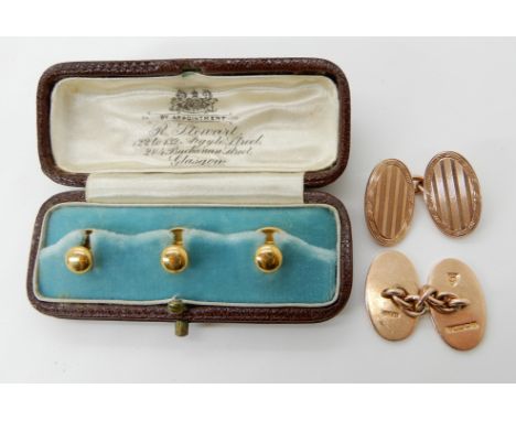 A pair of 9ct gold G.H Johnson cufflinks weight 11.6gms and a boxed set of three 18ct gold studs 2.4gms Condition Report: Ava
