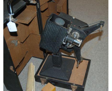 A Kodascope projector and cased screen Condition Report: Available upon request