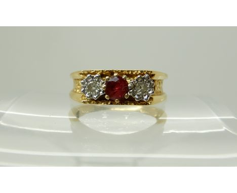 An 18ct retro ruby and diamond ring, size O1/2, weight 5.1gms Condition Report: Available upon request