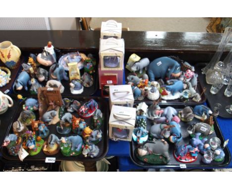 A collection of Eeyore figures including Simply Pooh examples, money box, trinket boxes, bouquets etc Condition Report: Avail