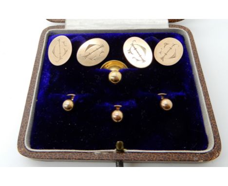 A pair of 9ct rose gold cufflinks, together with four 9ct gold shirt studs weight together 8.7gms Condition Report: Available