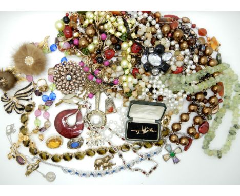 A 9ct gold pearl set swallow brooch and a collection of costume jewellery to include items by Miracle Condition Report: Not a