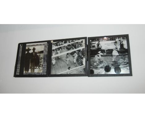A collection of glass slides, family portrait example etc, postcards, vintage photo album etc Condition Report: Available upo