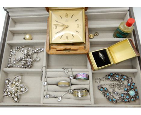 A white metal black enamel and pearl mourning ring, Smiths travel clock and other items Condition Report: Not available for t